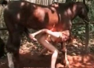 Wild babe is pleasing the horse