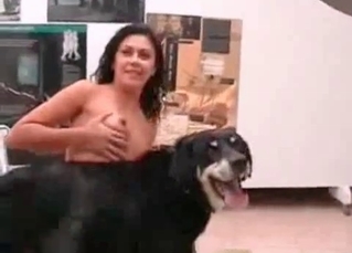 Lovely model is fond of playing with the dog