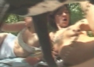 Young lady is enjoying sex with the dog