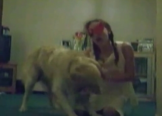 Masked whore is satisfying an animal