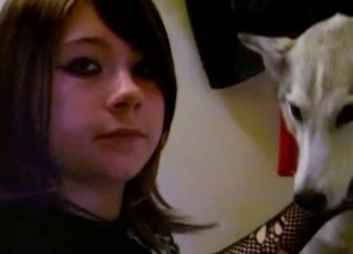 Emo teen hottie kissing her dog on cam